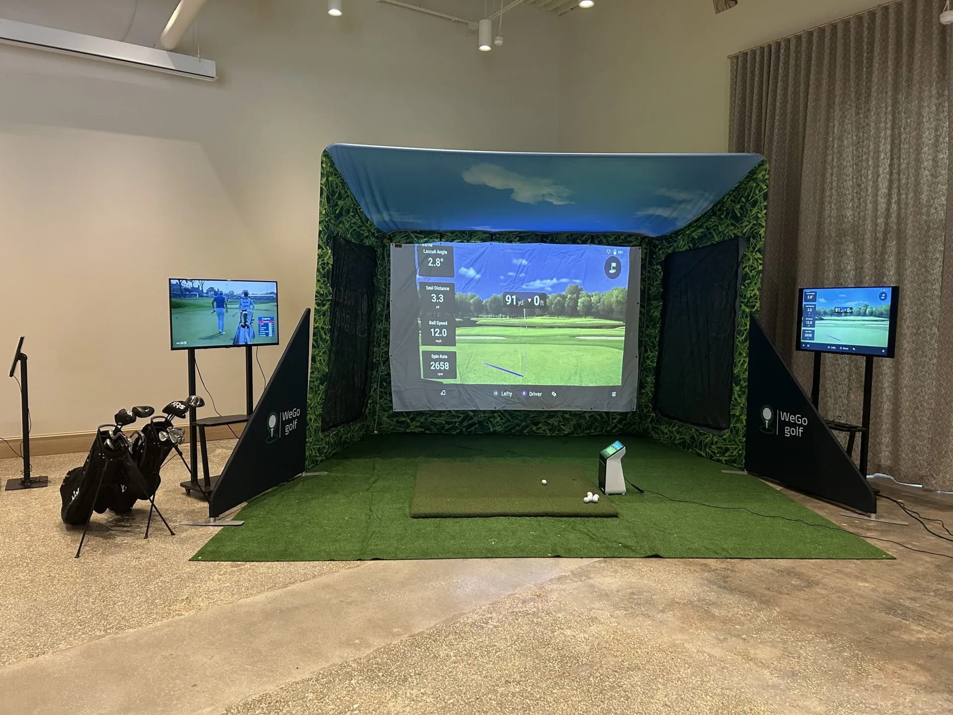 WeGo Golf branded hitting bay at a corporate tournament — serving Abilene, TX