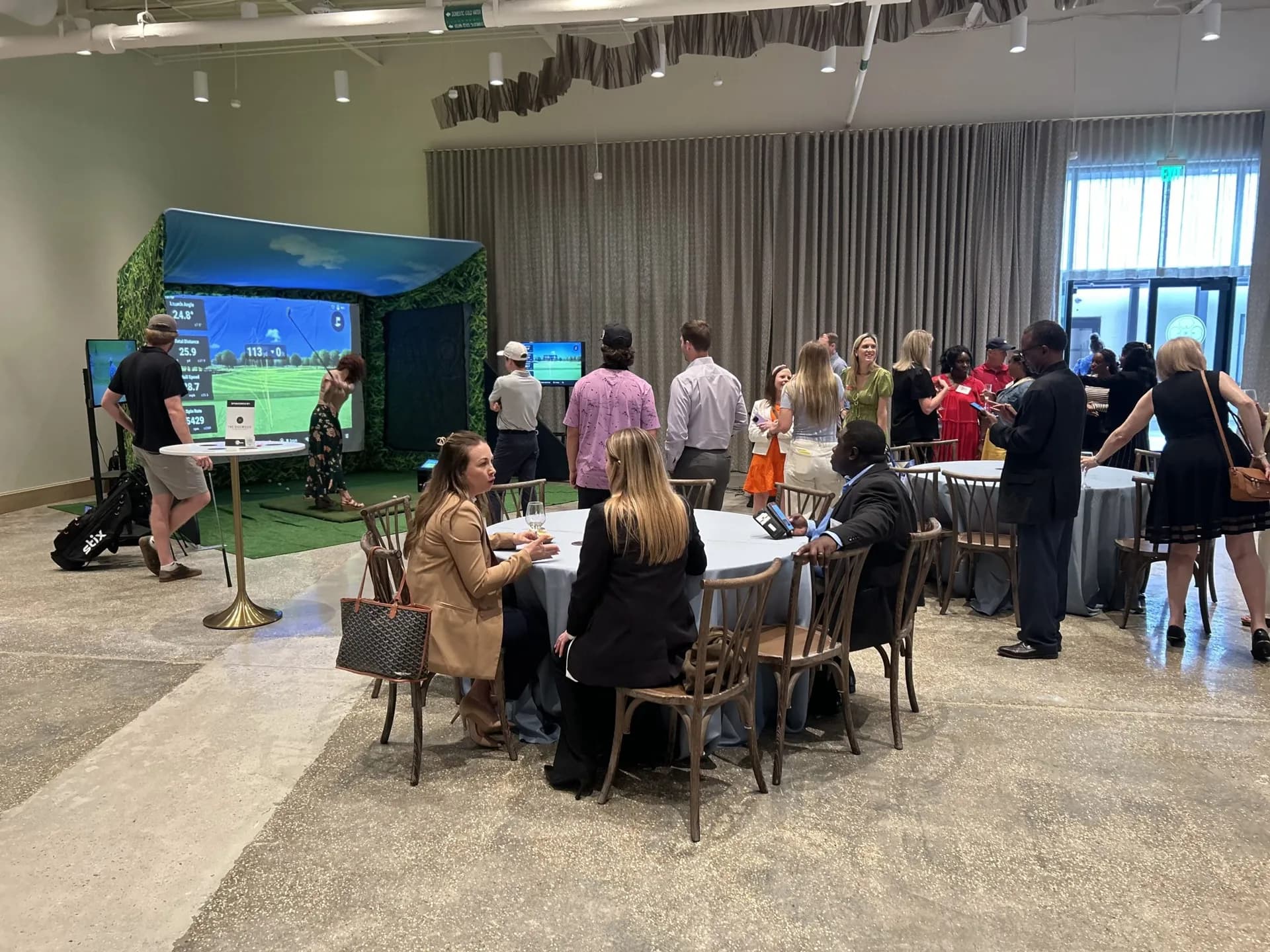 Colleagues enjoying a WeGo Golf event